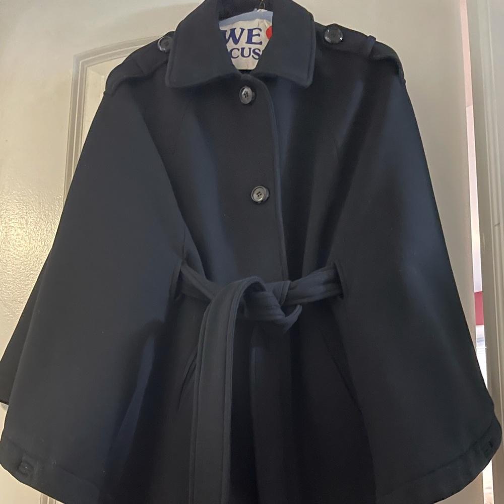Black cape coat.